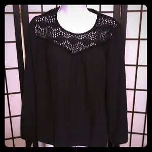 Black blouse with tie sleeves and intricate design